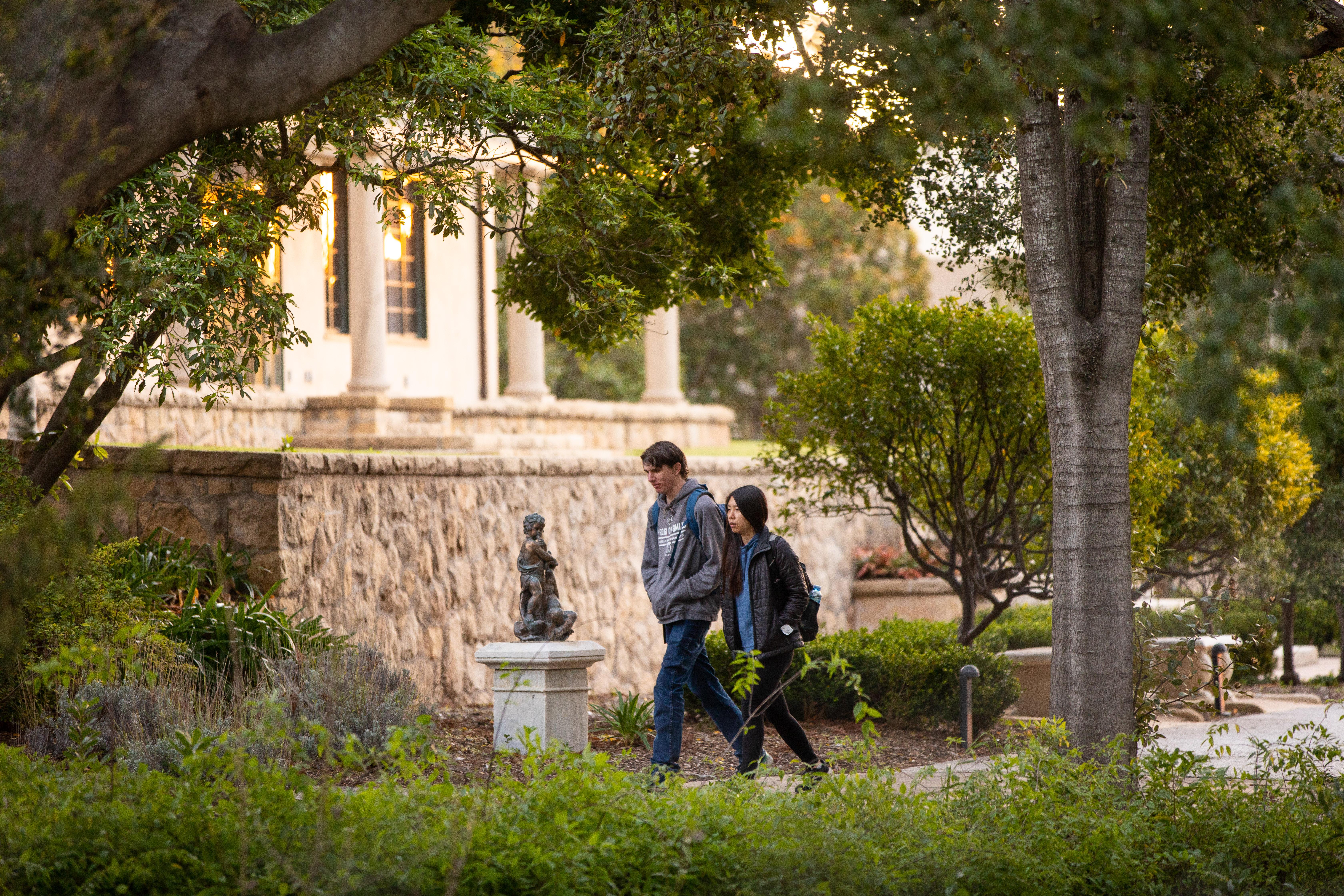 students walking past kerrwood hall